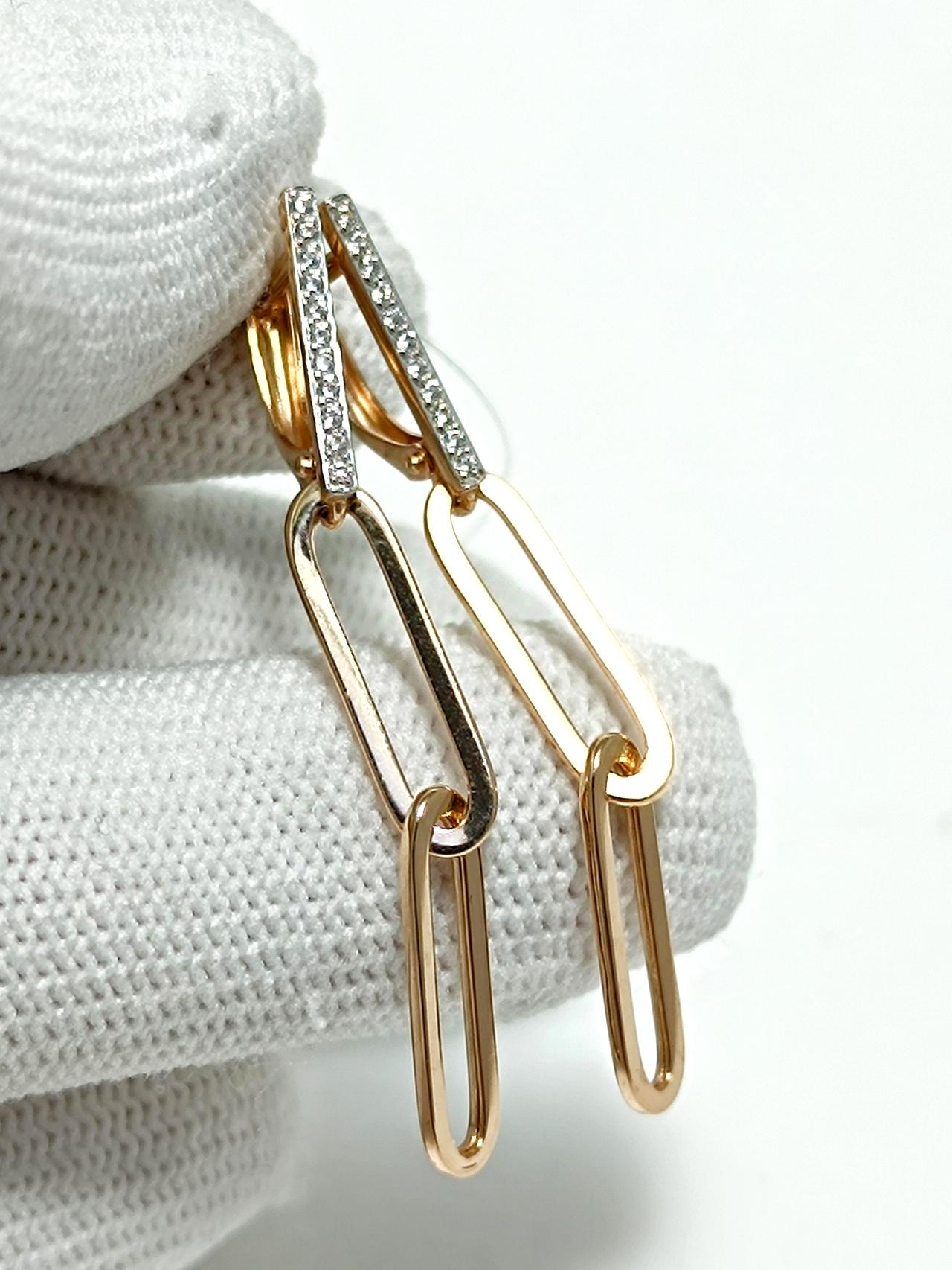 Золотые серьги звенья, вставка фианит