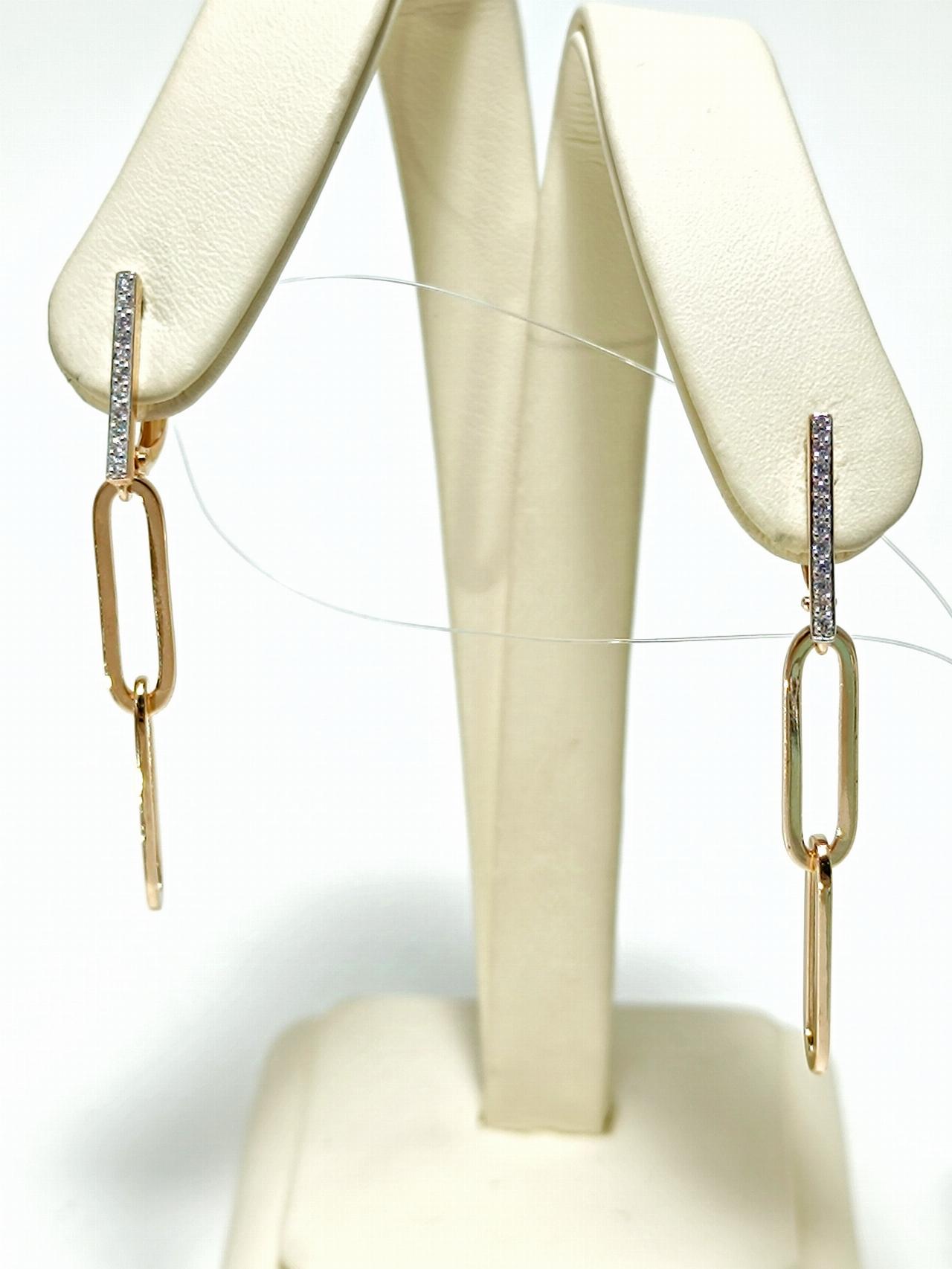 Золотые серьги звенья, вставка фианит