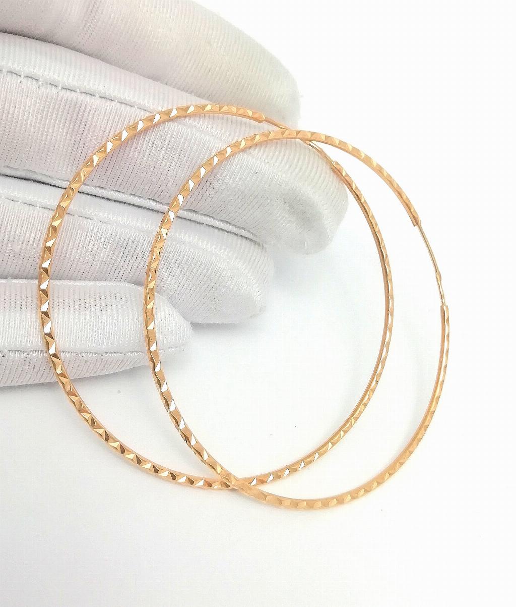 Золотые серьги конго