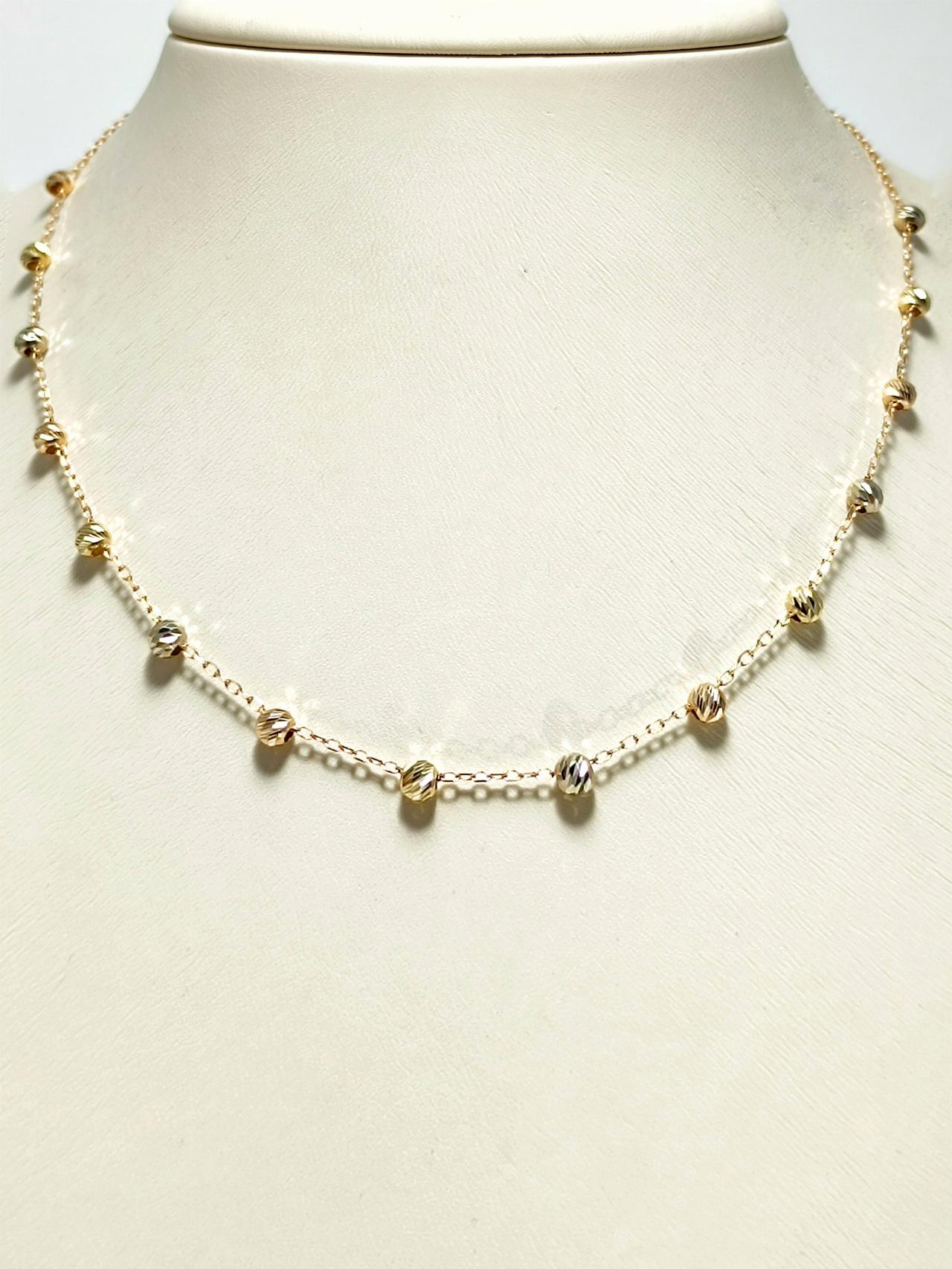 Золотое колье с шариками