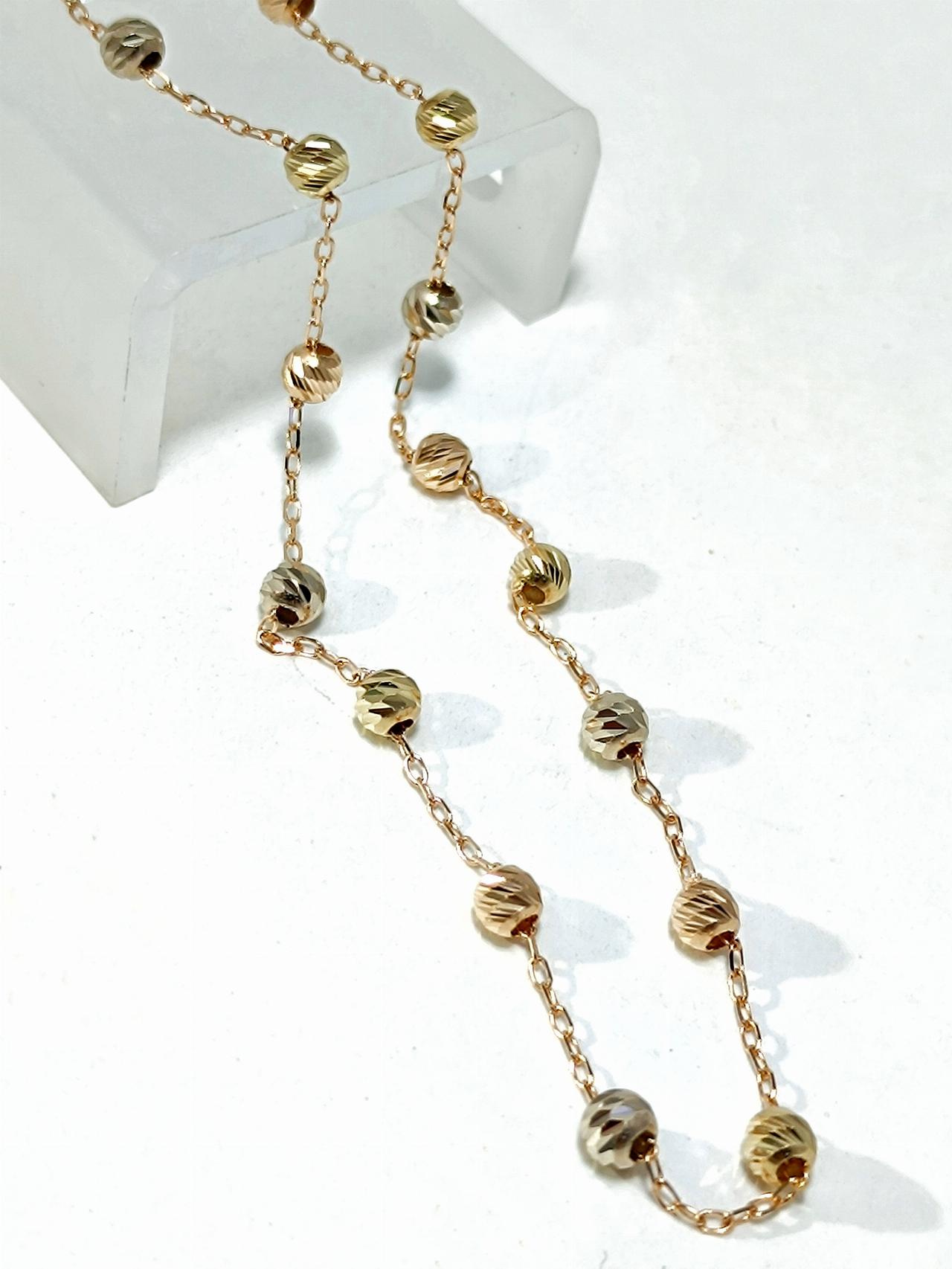 Золотое колье с шариками