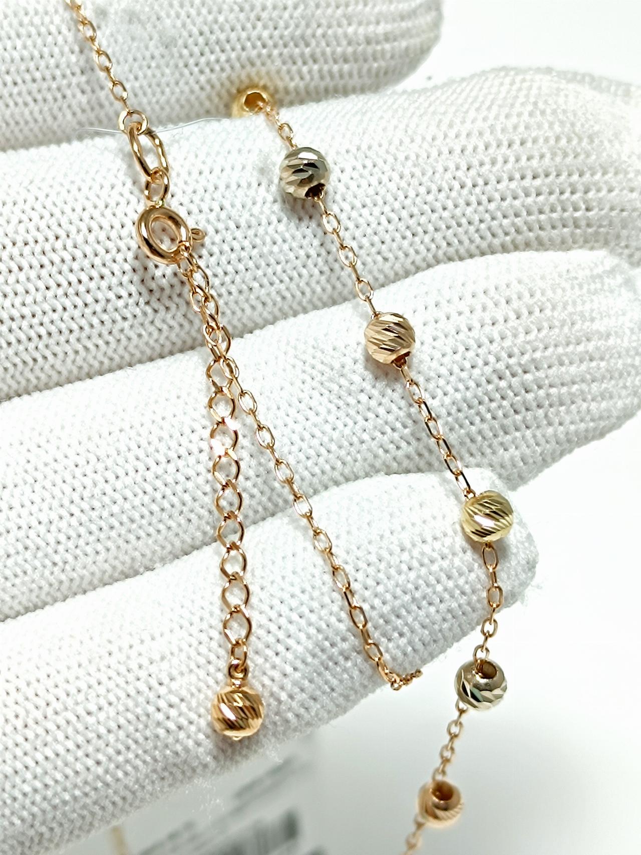 Золотое колье с шариками