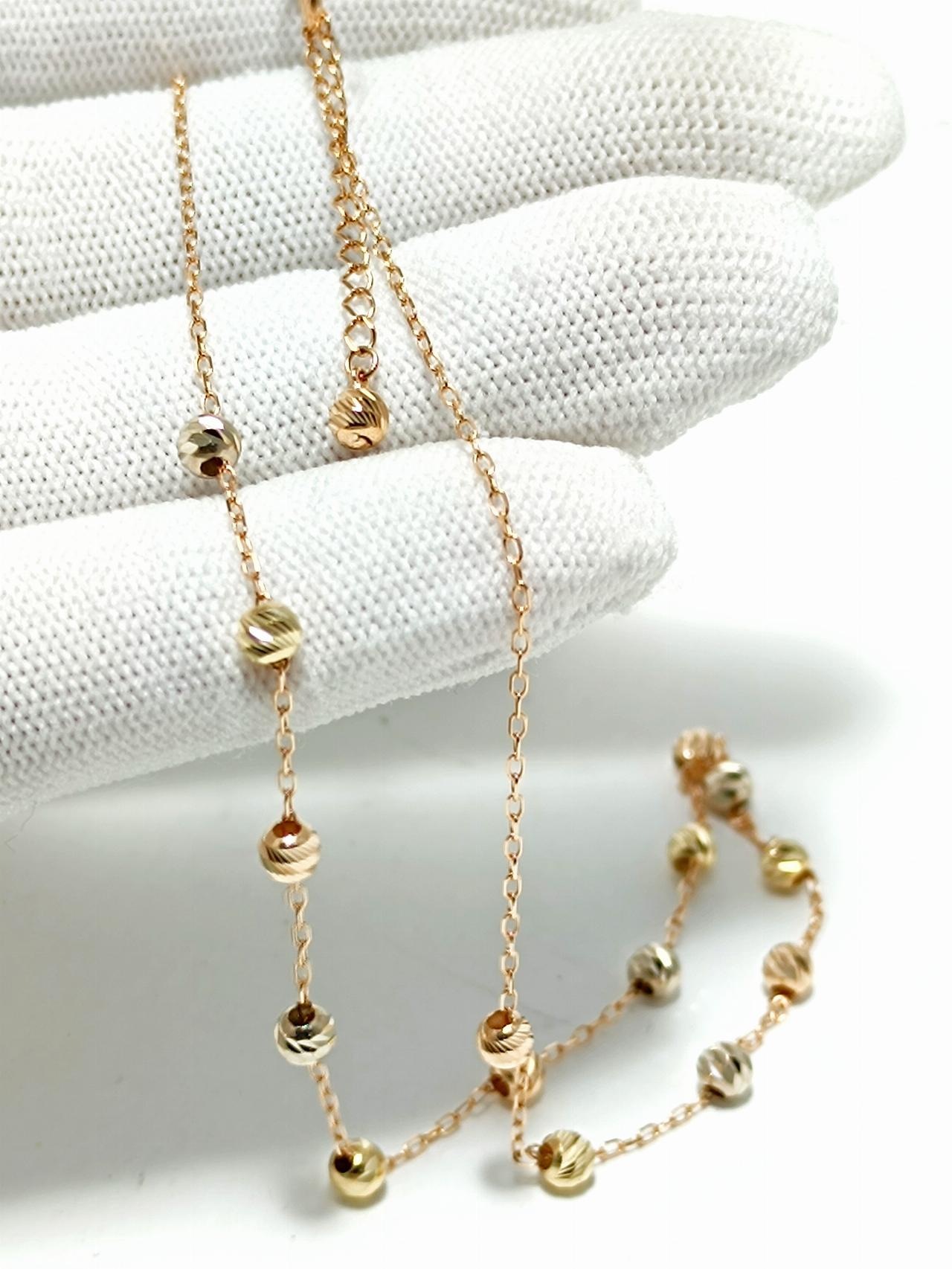 Золотое колье с шариками