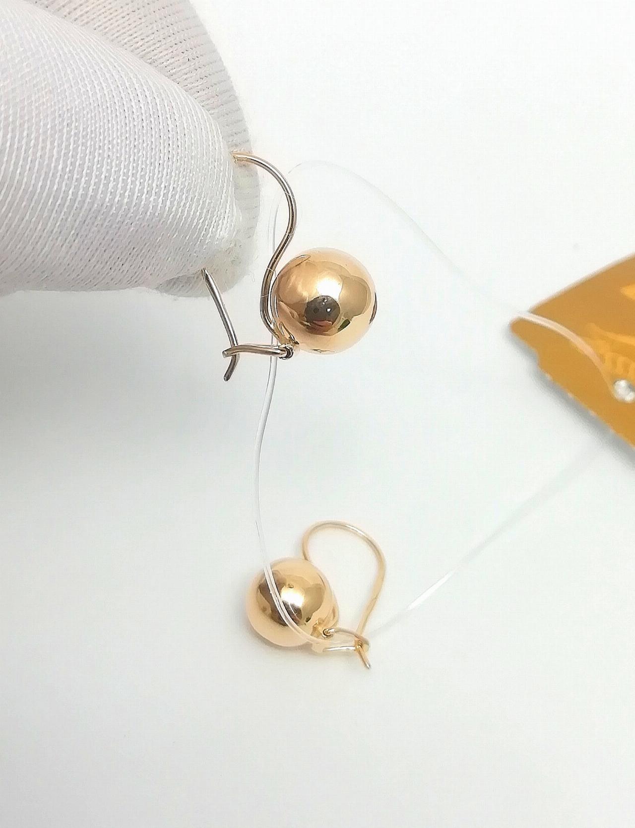 Золотые серьги шары