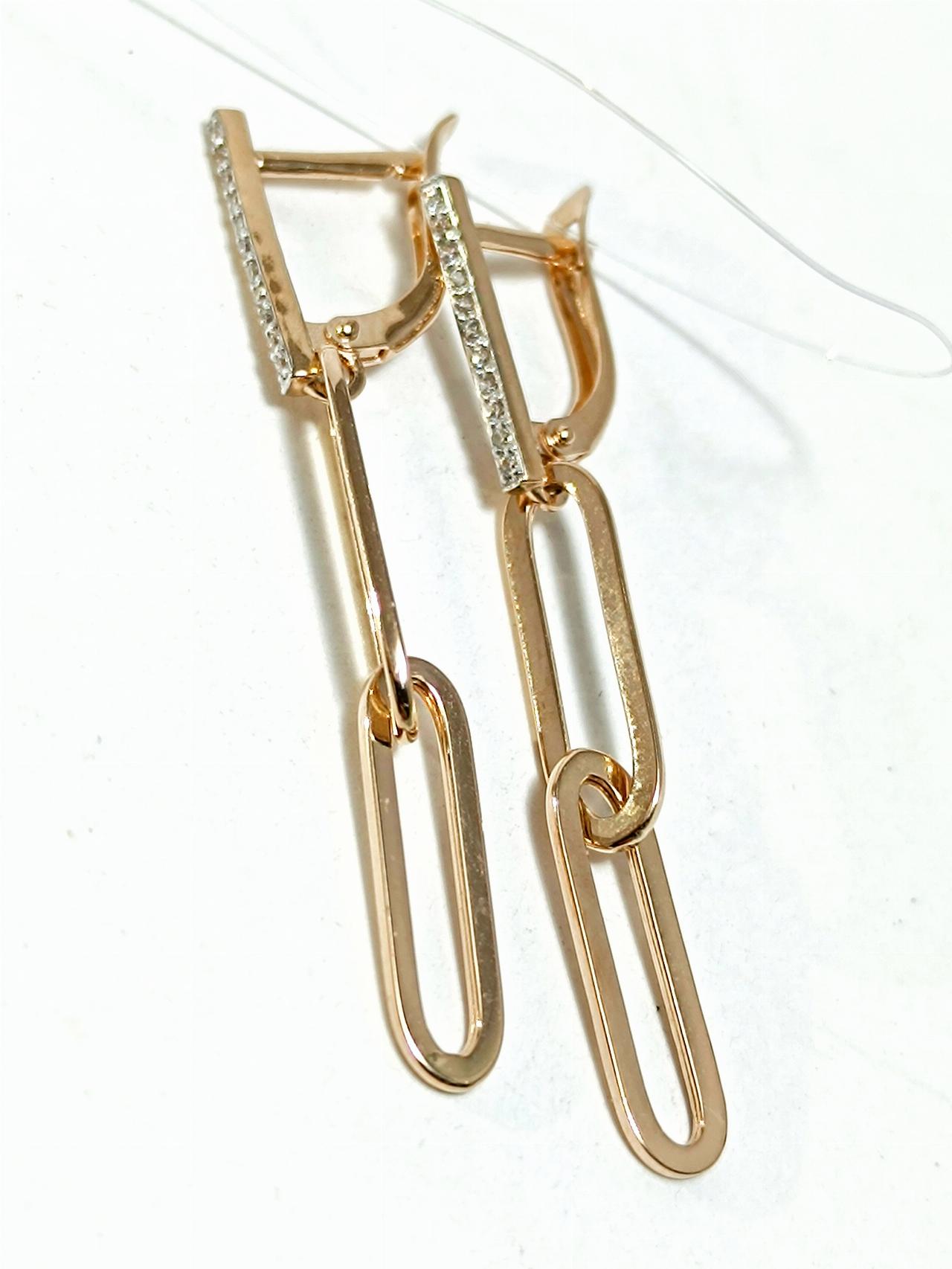 Золотые серьги звенья, вставка фианит