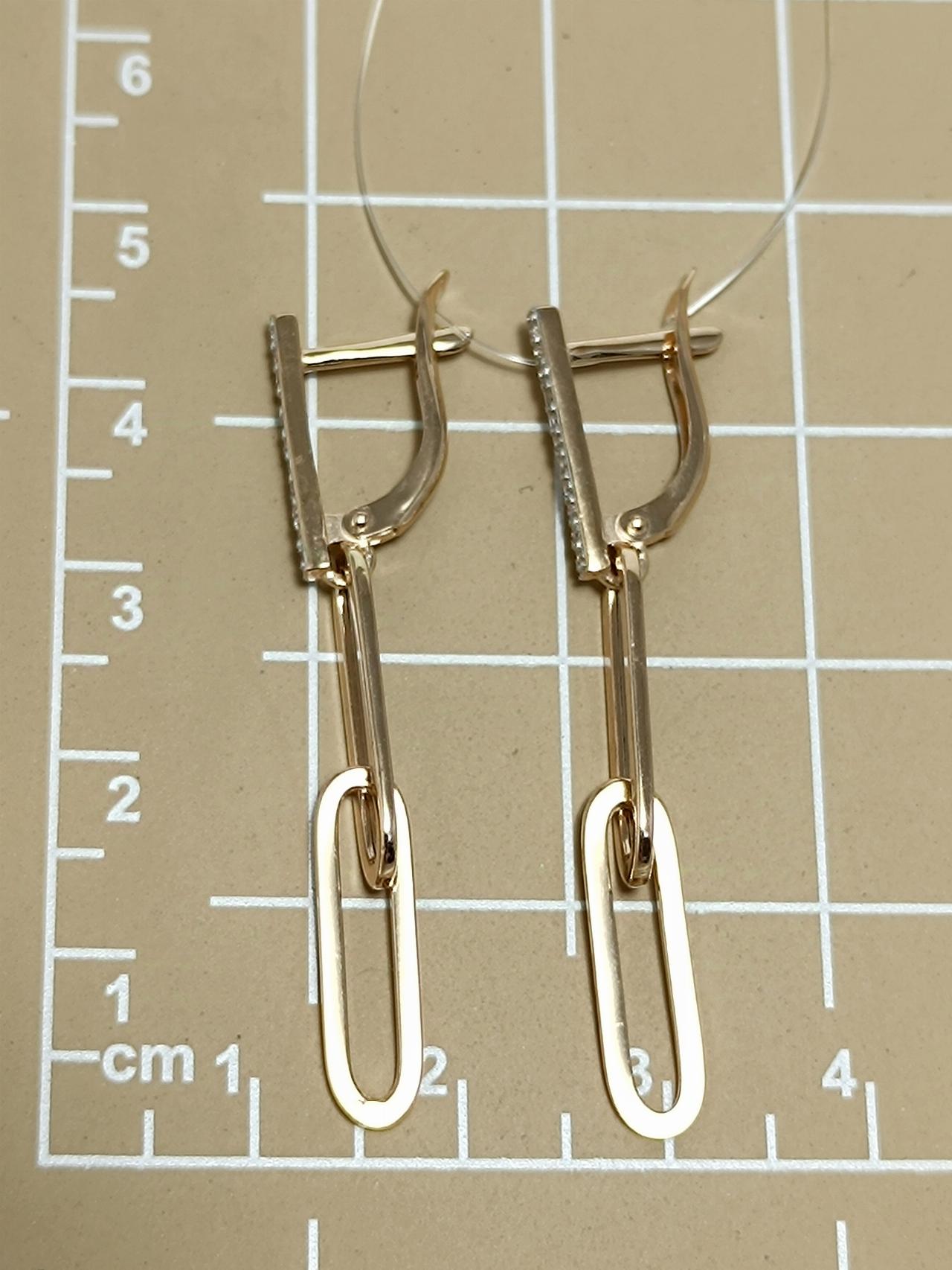 Золотые серьги звенья, вставка фианит