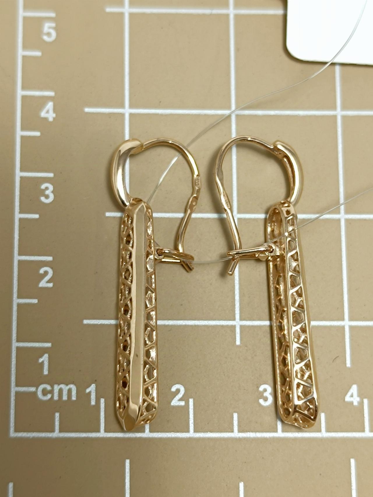 Золотые серьги длинные